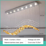 suspension lumineuse moderne gouttes cristal transparent verte ambrée 100cm 120cm 150cm
