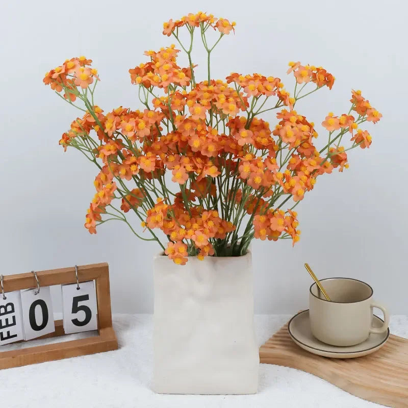 décoration intérieure bouquet fleurs artificielles soie marguerites jaunes blancs vases abstraits