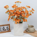 décoration intérieure bouquet fleurs artificielles soie marguerites jaunes blancs vases abstraits