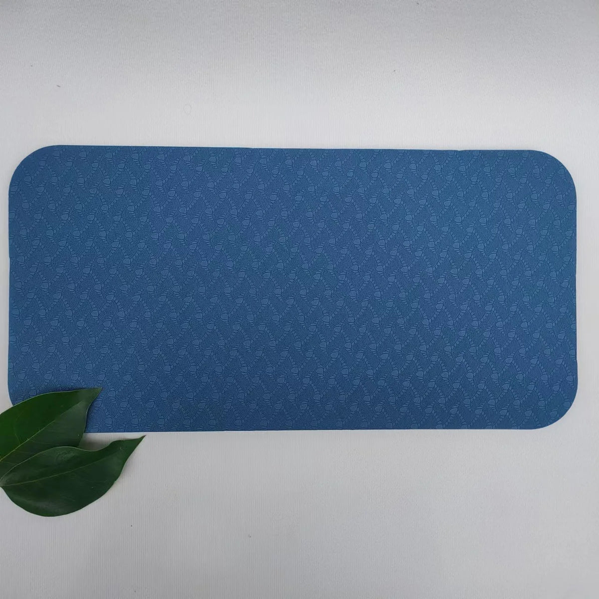 tapis couture anti dérapant réduit vibrations texture micro perforée moderne adhésif rose bleu marine