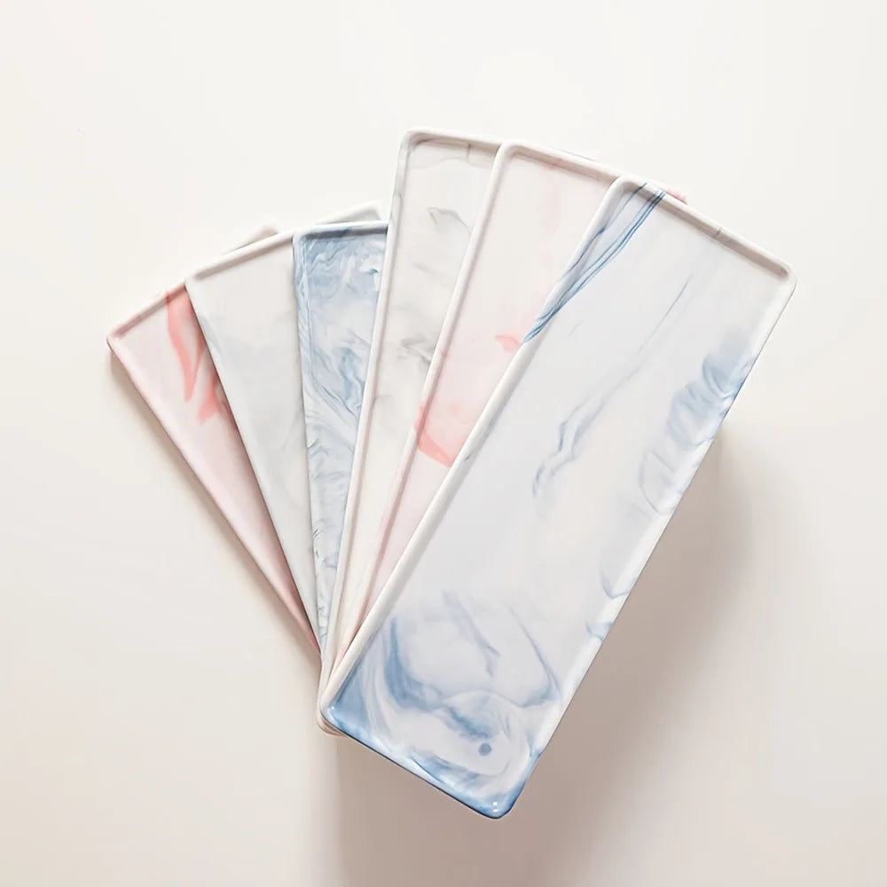 assiettes marbre blanc rose bleu moderne rangement salle bain coiffeuse domestique