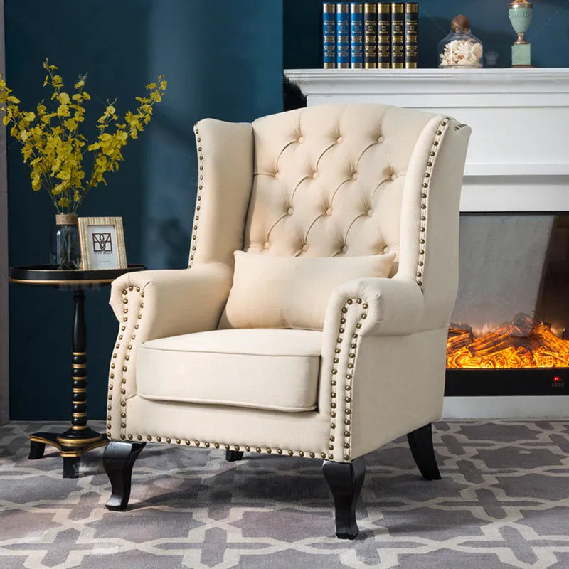 fauteuil club chesterfield tissu capitonné coussins décoratifs bois sculpté living room adult single sofa