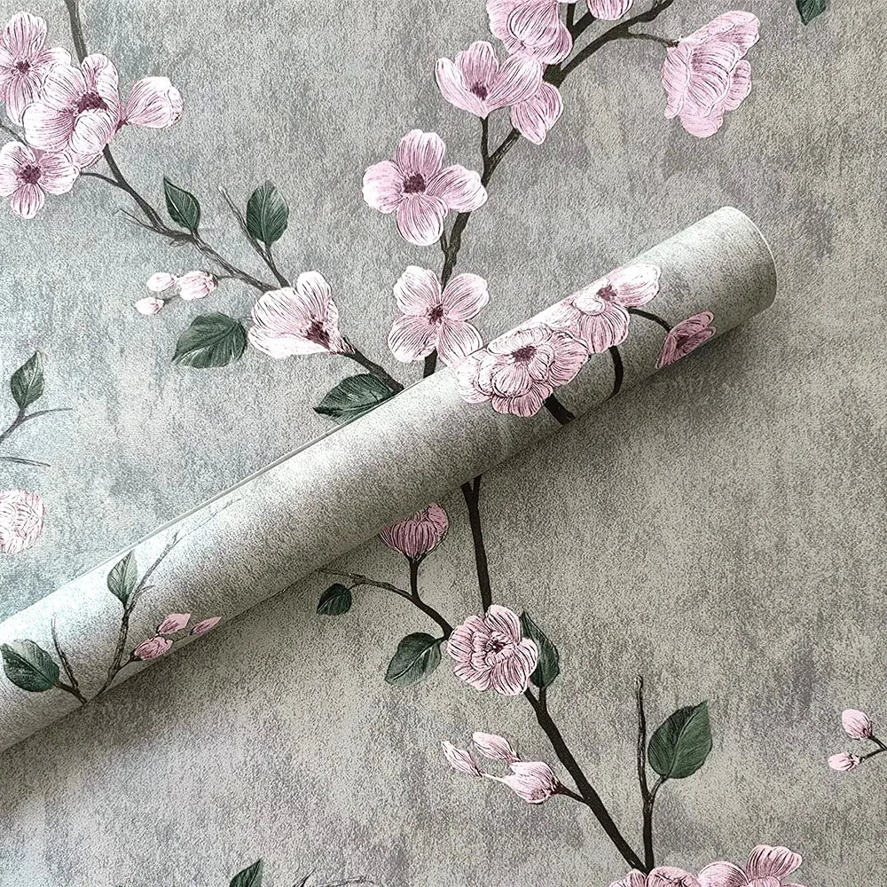 Détail du motif floral vert du papier peint