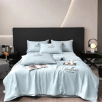 drap lit bleu clair broderie plumes bordure dorée moderne élégant coton doux maison