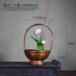 paniers vases bambou tissage floral arrangement marron artisanal rustique salon jardin anneaux métalliques