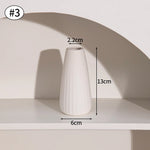 vase céramique blanc moderne rayures verticales fleurs artificielles décoration salon
