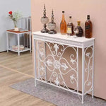 console classique vintage bois ornements floraux marron noir blanc decoration salon couloir