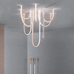 lustre moderne blanc doré courbes élancées contemporain sans plaque télécommande lumière led