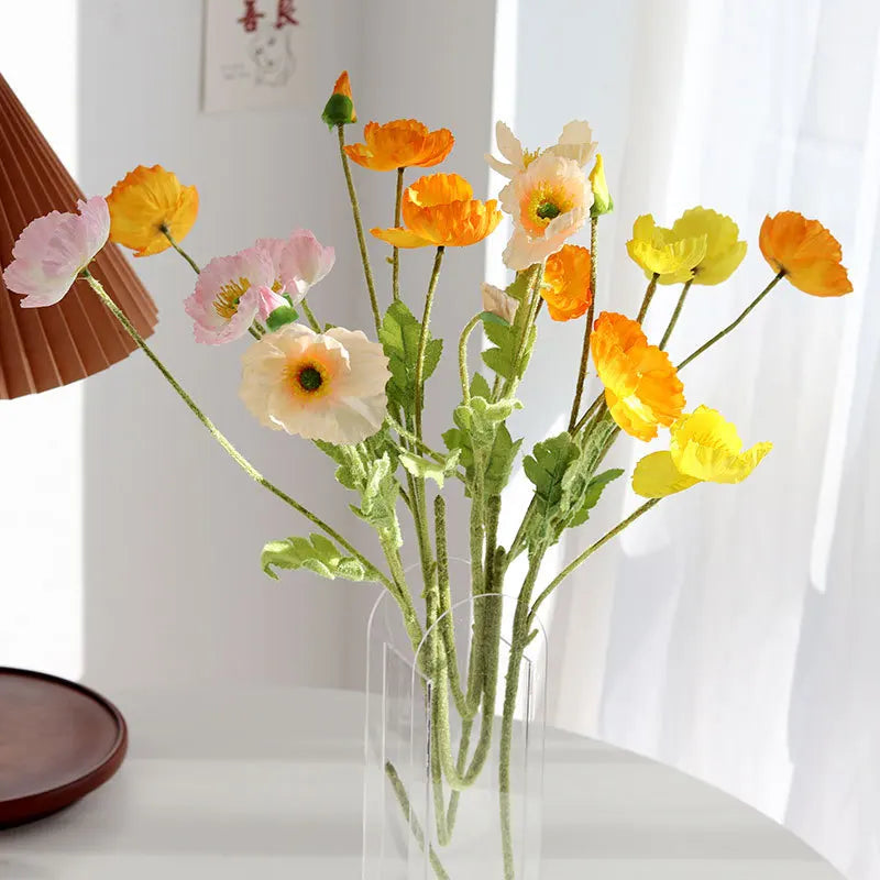 bouquet fleurs artificielles moderne mariage intérieur blanc jaune orange bleu feuilles vertes