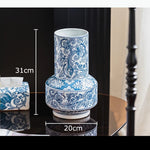 vase bleu blanc floral oiseaux classique traditionnel decoration table arrangement floral