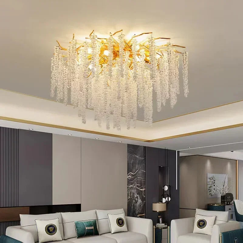 lustre moderne transparent branches goutte doré élégant illumination chambre salon