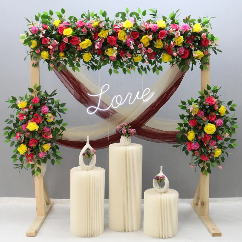 arche décorative mariage fleurs artificielles feuilles vertes roses classique romantiqueextérieur anniversaire événement