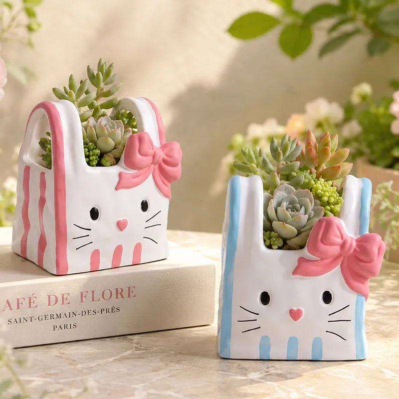 cache pot résine forme chat blanc bleu rose yeux noirs narines roses sourcils noirs