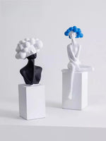 statuette décorative buste féminin noir blanc bleu or moderne minimaliste.surface lisse polie.formes arrondies socle