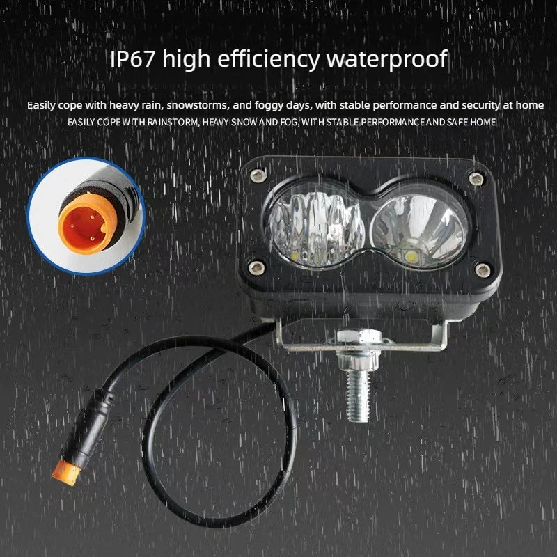 lampe travail moderne robuste noire lentilles jaunes vis fixation câble connecteur orange