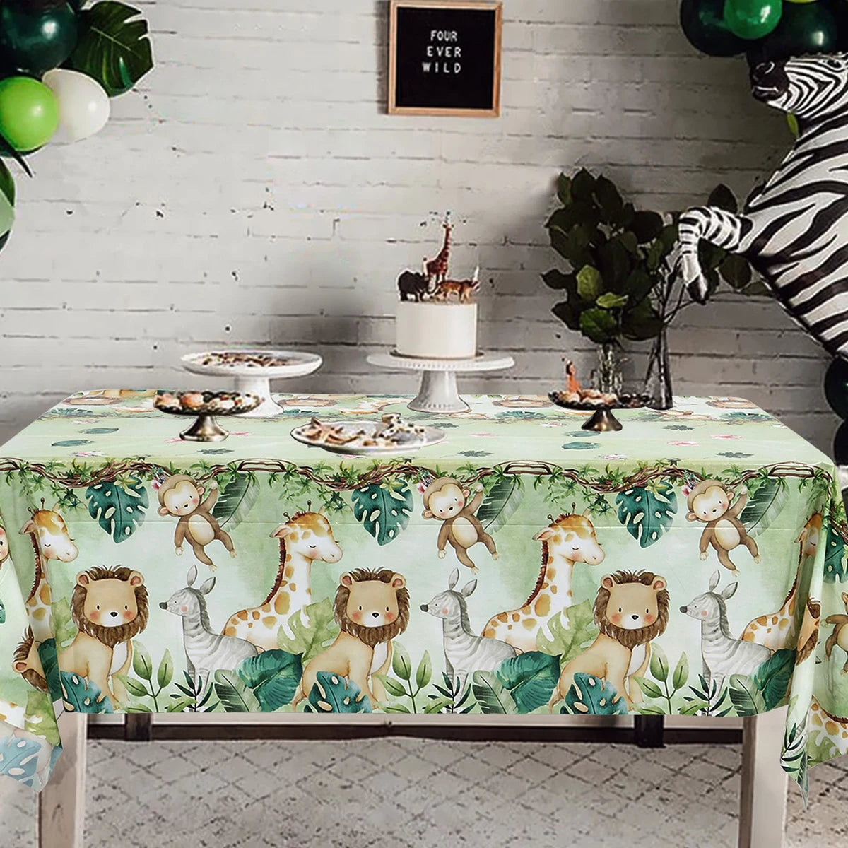 nappe anniversaire animaux jungle girafe lion zèbre singe vert clair feuilles tropicales enfantines festive