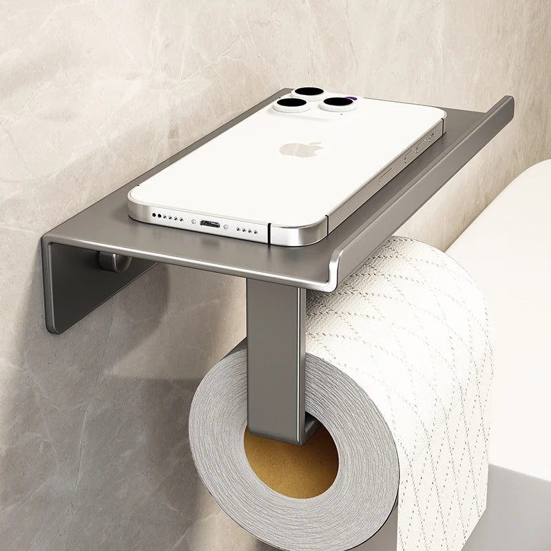 Porte-papier hygiénique mural rouge monté près des toilettes avec étagère pratique