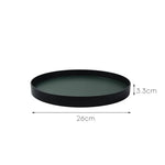 présentoir rond moderne plateau uni vert foncé orange noir maquillage soins parfums cosmétiques table