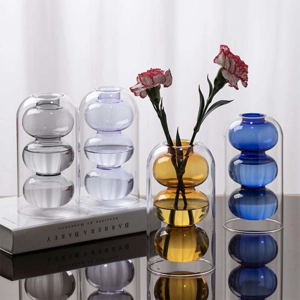 vase verre moderne bleu jaune gris violet transparent sphères empilées décoration maison plante artificielle