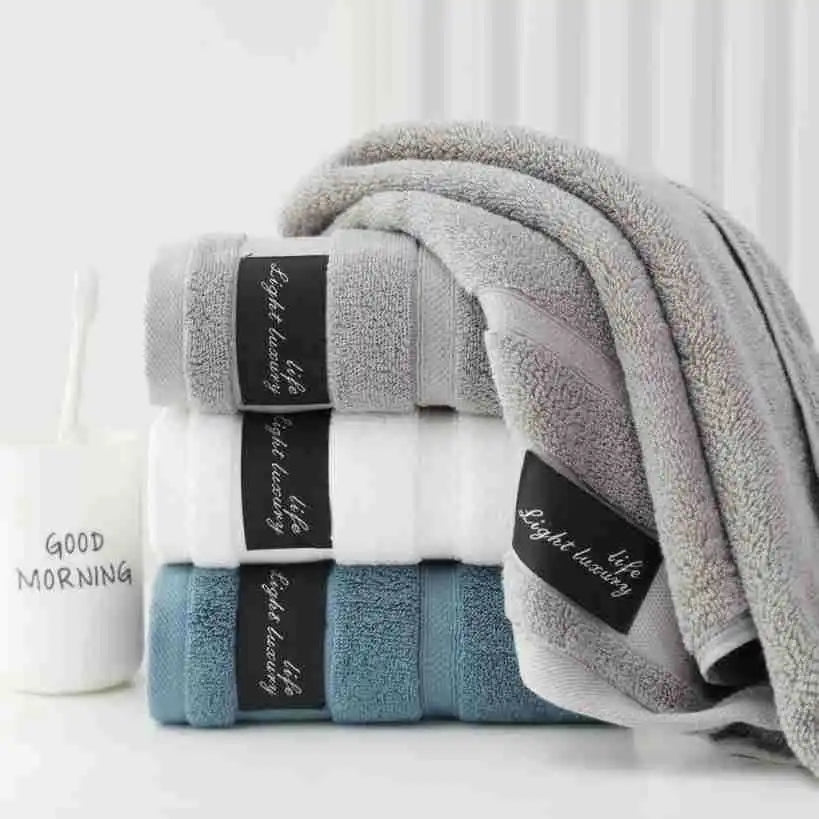 serviettes bain coton gris blanc bleu modernes élégantes absorption durable machine toilette simple
