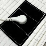 coussin chauffant électrique blanc rayures câble prise bouton contrôle moderne blanc noir
