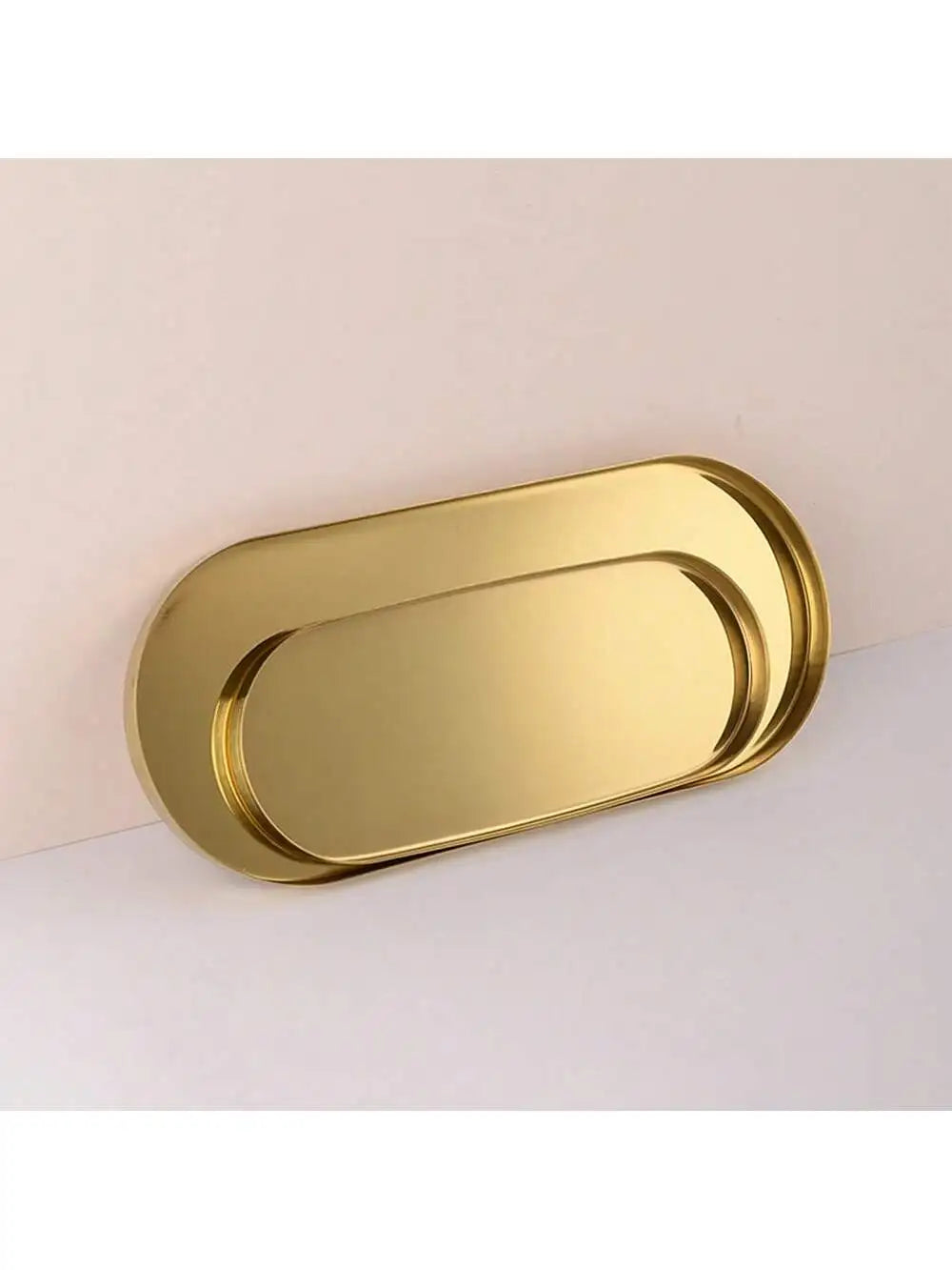 plateau ovale doré lisse moderne rangement beauté accessoires décoration événements festive minimaliste