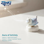 statuette artisanale chat blanc bleu rose gris texture craquelée moderne décoration intérieure base plate