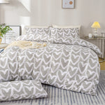 ensemble literie housse couette deux taies d'oreiller coeur gris blanc moderne
