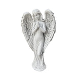 Statue d'ange décorative sur une terrasse extérieure