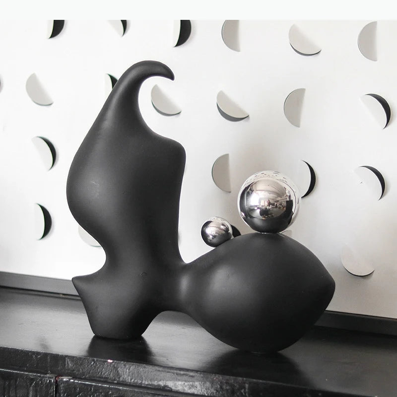 sculpture abstraite moderne plusieurs parties forme organique noir mat sphères argentées