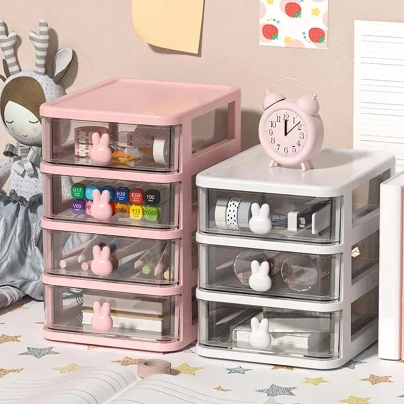 boîtes rangement tiroirs transparents rose poignées lapins rubans adhésifs stylos crayons maquillage cahiers bille