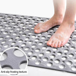 Tapis de douche rouge antidérapant avec fixation par aspiration