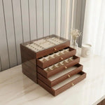boîtes bijoux marron foncé texture bois moderne poignées dorées compartiments multiples rangement bijoux
