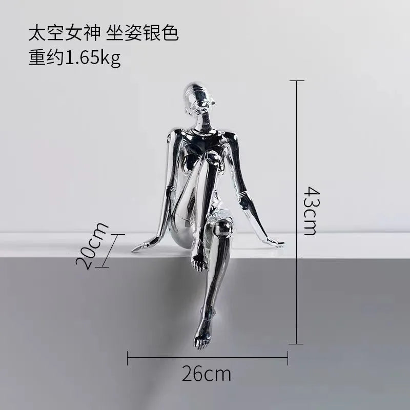 figurine humaine moderne argentée table chaises vases livres decoration intérieure robotique