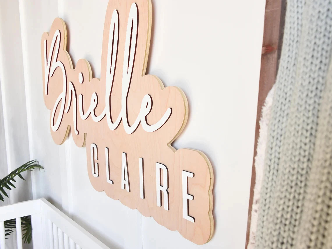Décor mural personnalisé avec nom de bébé en rose dorée