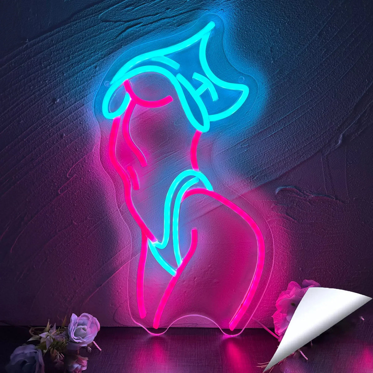 Enseigne au néon LED rose allumée dans une chambre moderne