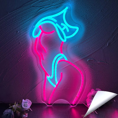 Enseigne au néon LED rose allumée dans une chambre moderne