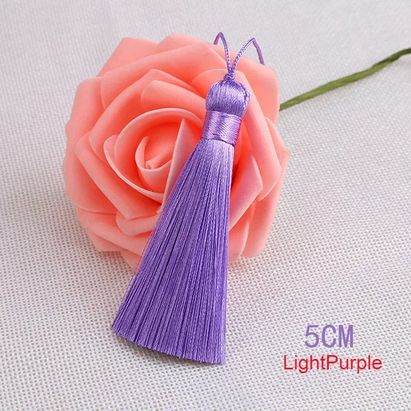 pompons polyester couleur variée 5cm longueur 18cm décoration artisanale rideaux couture pièces