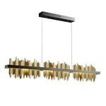suspension lumineuse or contemporaine motifs géométriques texture pierre fixations chaînes haute luminosité
