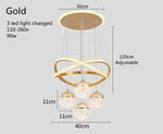 suspension lumineuse moderne or noir anneaux boules translucides led clips