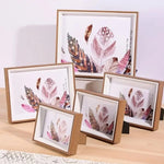 Cadre photo mural 18x24 dans un salon