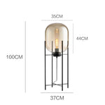 lampe sol moderne transparente ampoule filament noir gris fumé led verre minimaliste