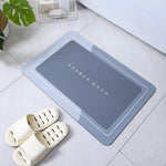 tapis bain moderne ovale motifs pas couleurs bleu marine gris clair rose violet texture