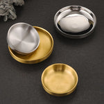 assiettes rondes inox lisses modernes argent doré sauces snacks transparentes maison restaurant