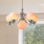 lustre moderne chrome sphères translucides suspension câble led têtes têtes orange