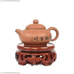 support bois sculpté motifs floraux artisanal decor maison marron foncé tranchant deco vase pot