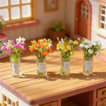 bouquet fleurs violet rose blanc verre transparent vase minimaliste decoration intérieure artificiel simple