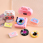 jouets miniatures rétro rose blanc bleu jaune noir radiographe tourne disque cassettes vinyles