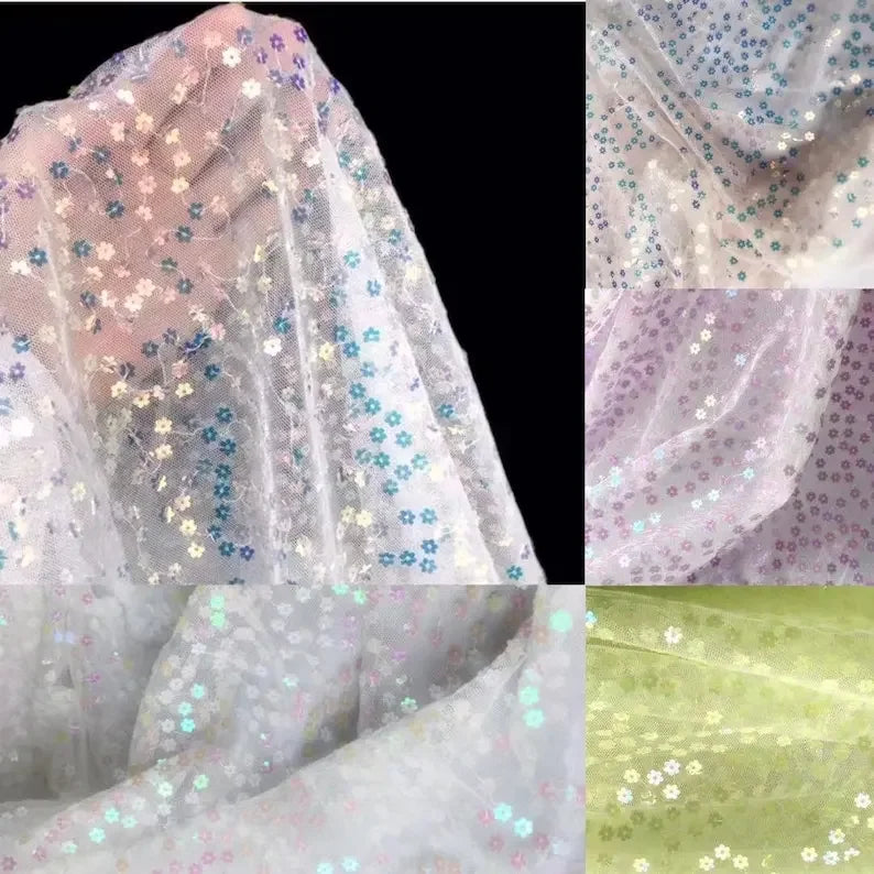 tissu dentelle fleurs colorées paillettes blanc rose bleu vert translucide festif