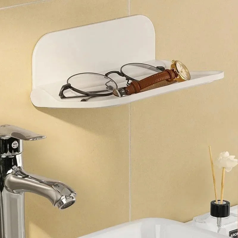étagère murale pliable blanche minimaliste adhésifs lunettes montres calendriers stylos figurines serviettes parfums